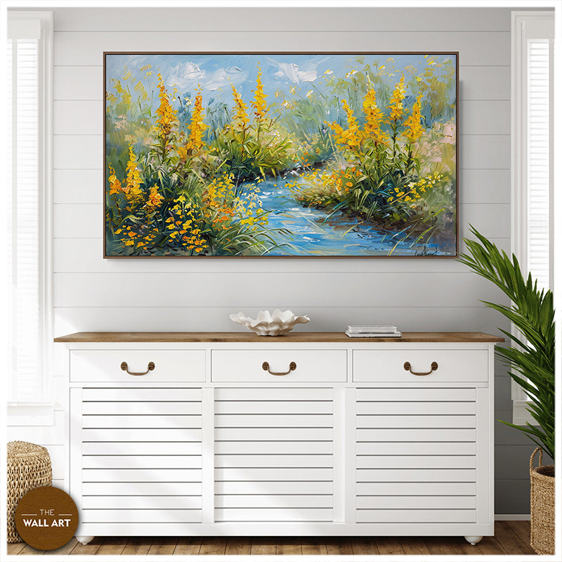 CREEK THROUGH YELLOW FLOWERS